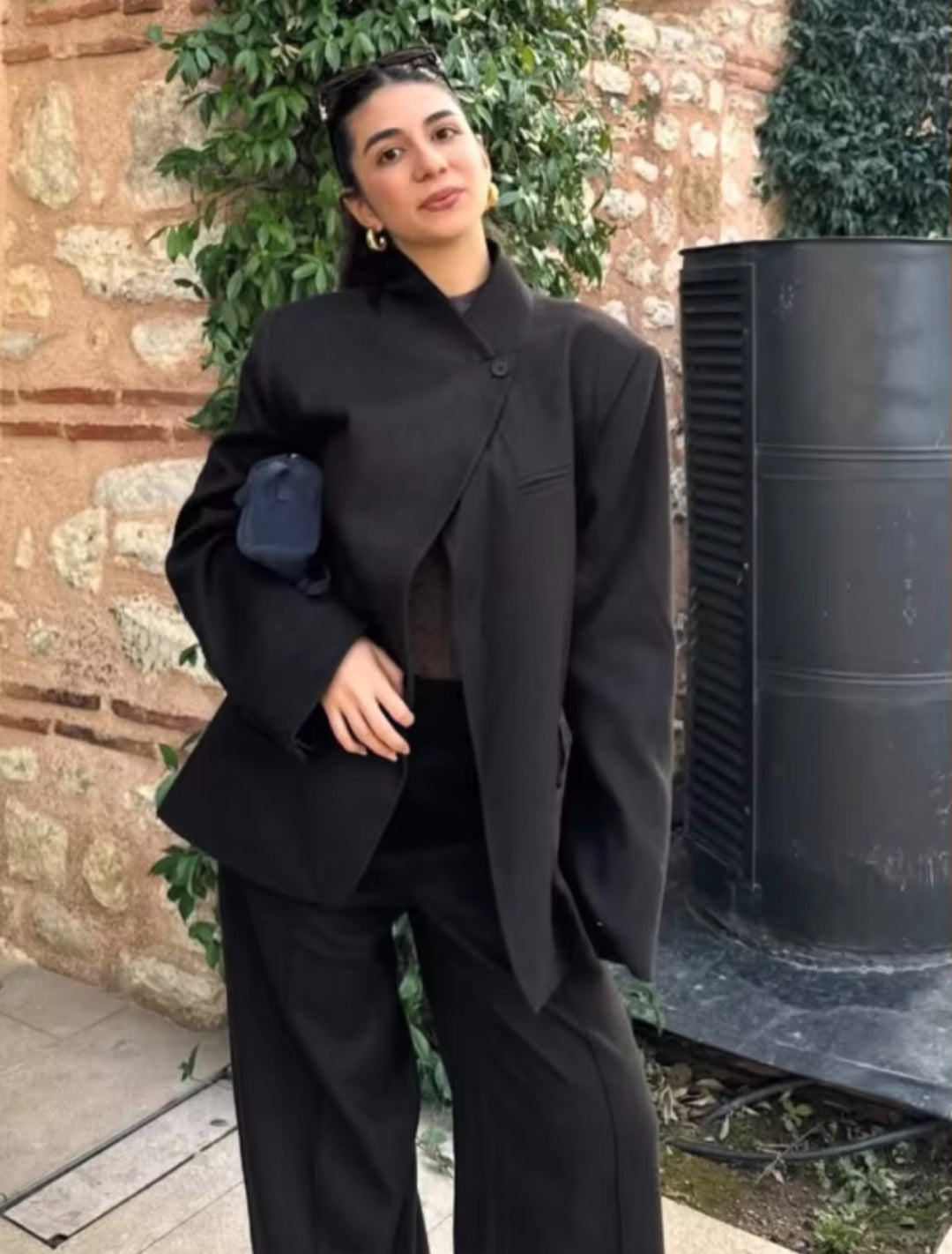 Women's oversized blazer in boxy cut with asymmetrical stand collar and concealed button placket Mune Fashion