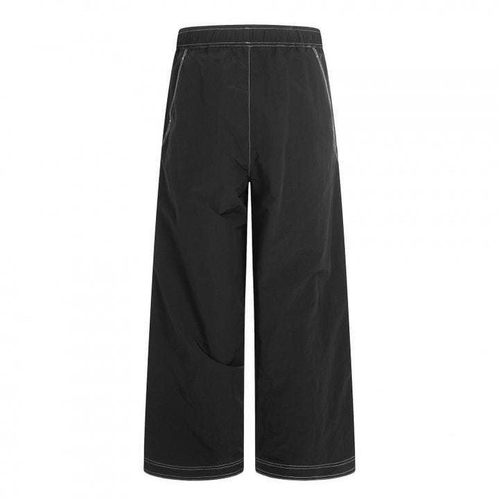 Women's wide pants with elastic waistband, drawstring and contrasting decorative seams Mune Fashion