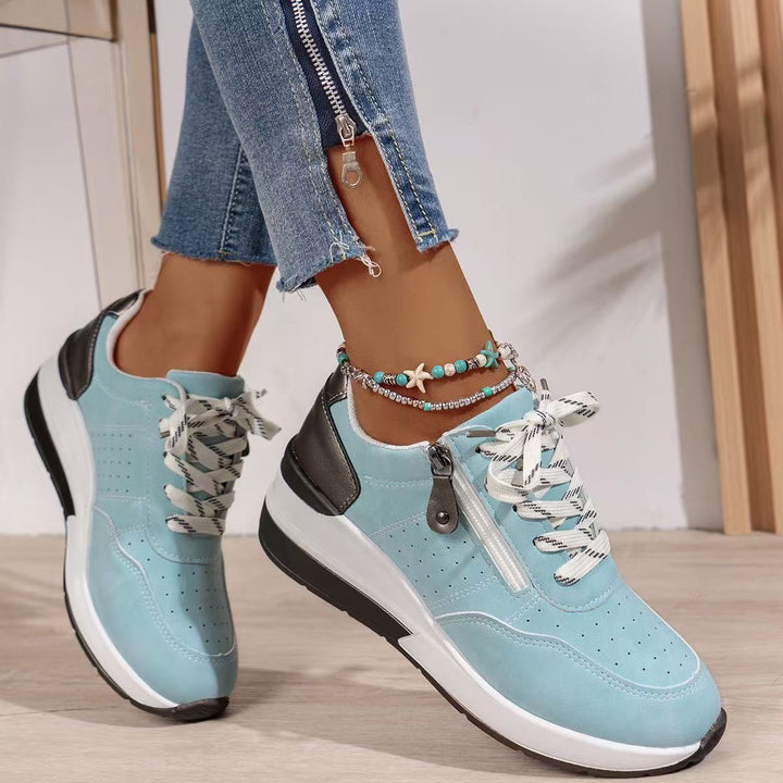 Women's wedge sneakers with side zipper and perforated upper material Mune Fashion