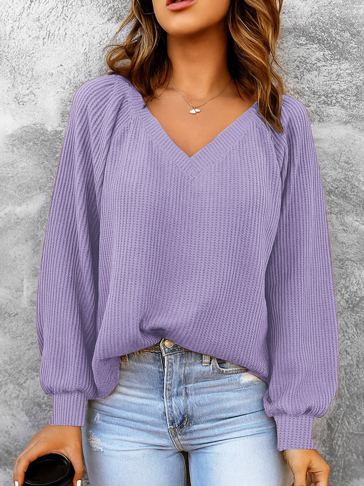 Women's fine structure knit sweater with V-neck, balloon sleeves, and ribbed cuffs Mune Fashion