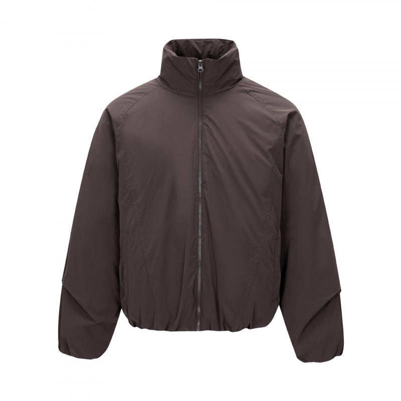 Unisex Short cut lightweight windbreaker in boxy cut with high stand-up collar and elastic hem Mune Fashion