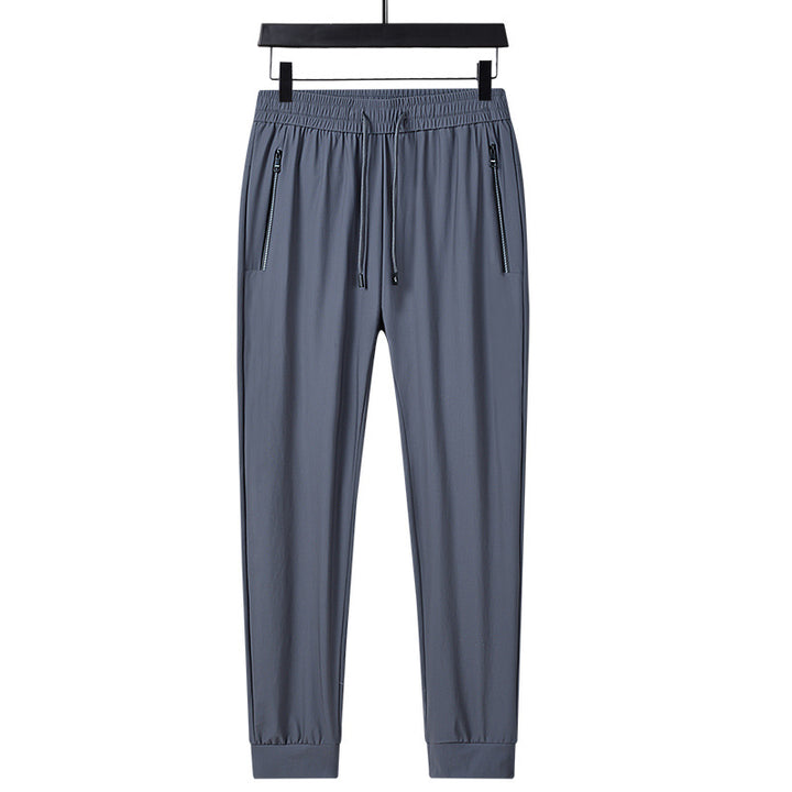 Men's sporty training pants with functional zippered pockets Mune Fashion