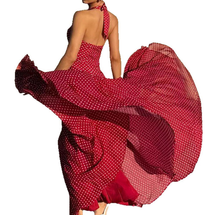 Ladies long halter dress with deep V-neck, tailored empire seam and flared layered skirt Mune Fashion