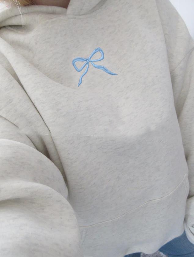 Women's hoodie with floral embroidery design and printed hood lining Mune Fashion