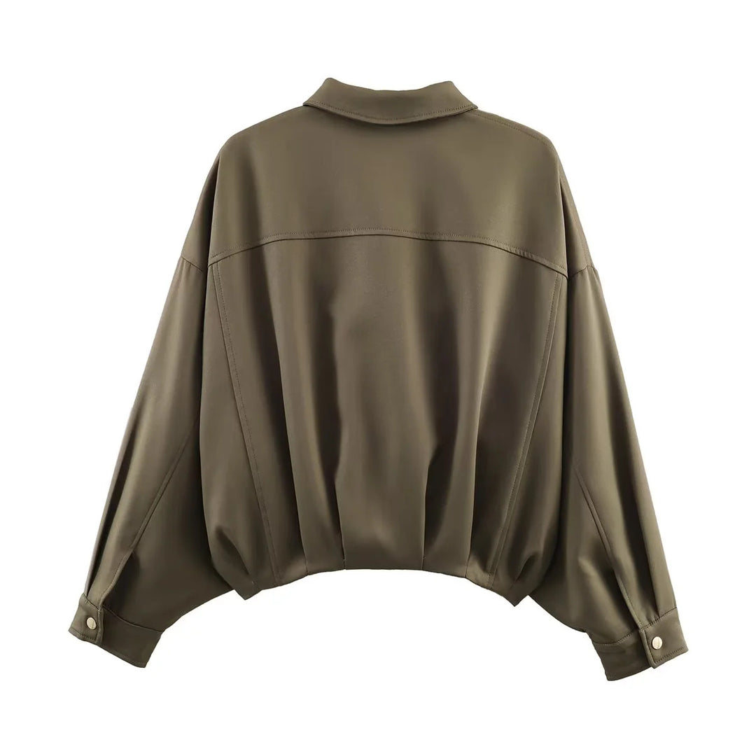 Women’s oversized utility jacket with oversized flap pockets, dropped shoulder, and elastic waistband Mune Fashion