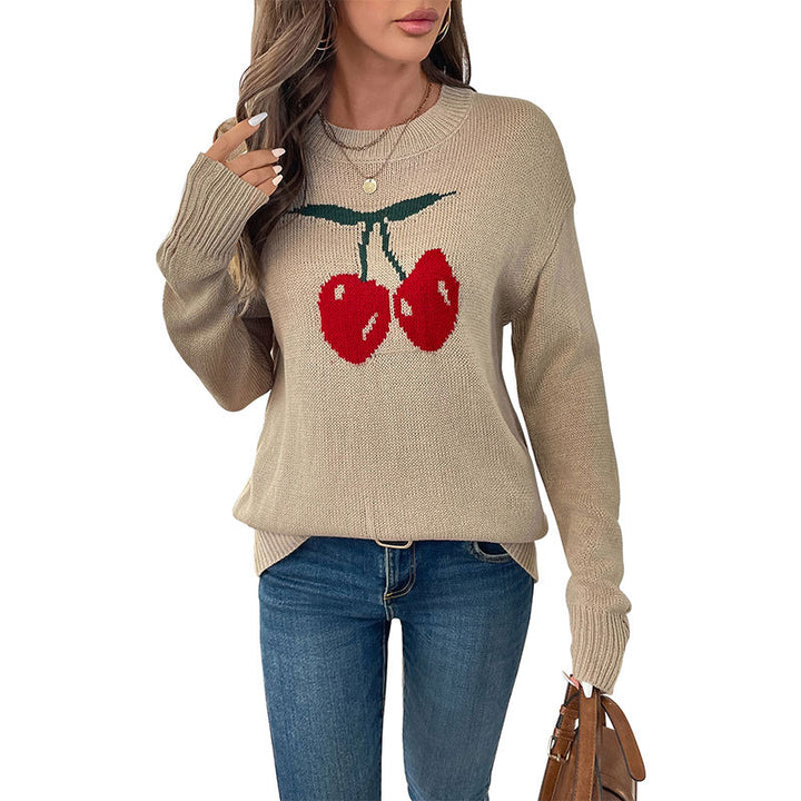 Women’s knitted sweater with cherry intarsia, round neck and casual oversized fit Mune Fashion