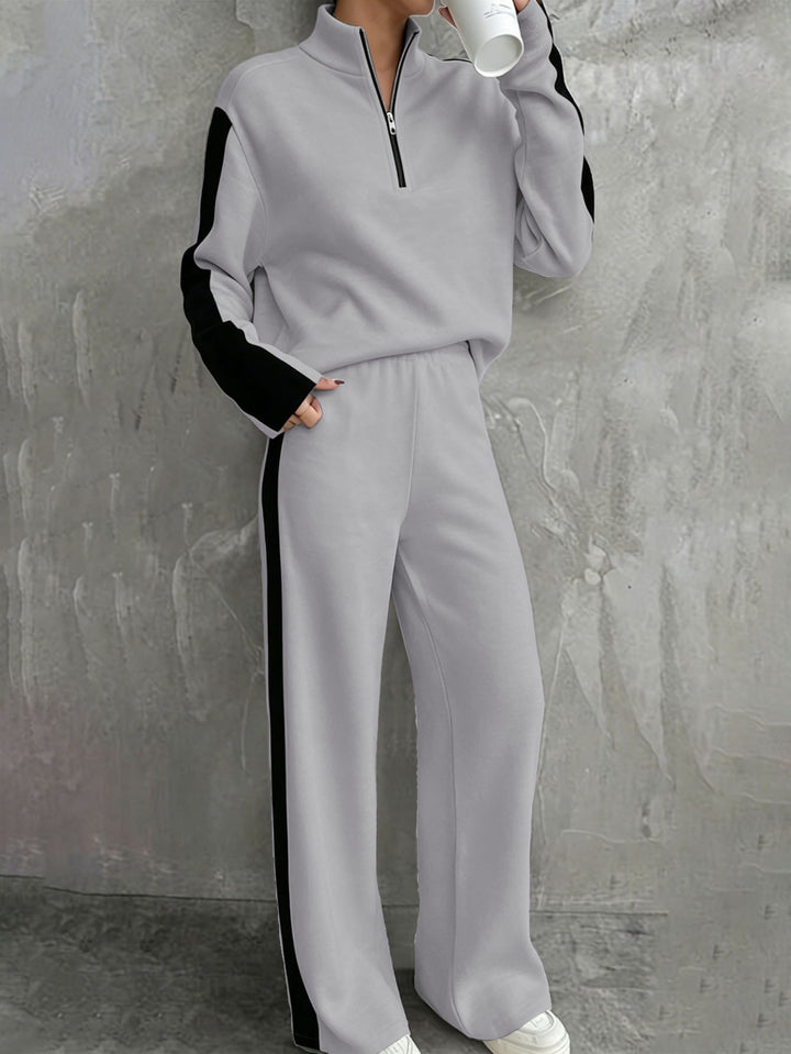 Women's casual tracksuit set with half zip, elastic waistband and side contrast stripes Mune Fashion