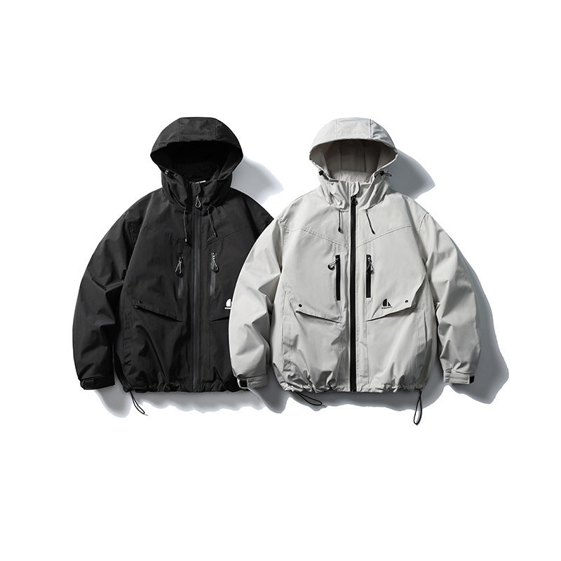 Unisex Waterproof technical hooded jacket with multiple pockets and adjustable hem Mune Fashion