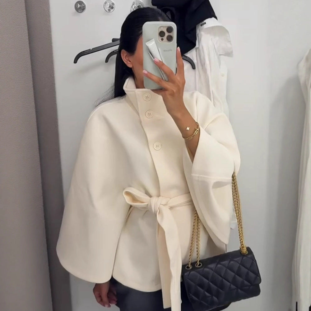 Ladies oversized cape jacket with stand-up collar, concealed button placket and belt Mune Fashion