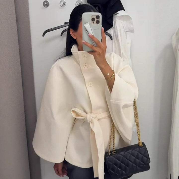 Ladies oversized cape jacket with stand-up collar, concealed button placket and belt Mune Fashion
