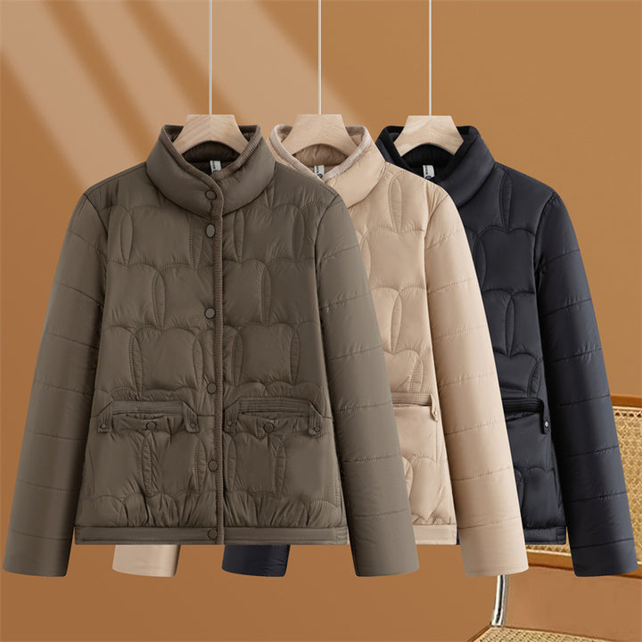 Women's short quilted transitional jacket with stand-up collar and flap pockets Mune Fashion