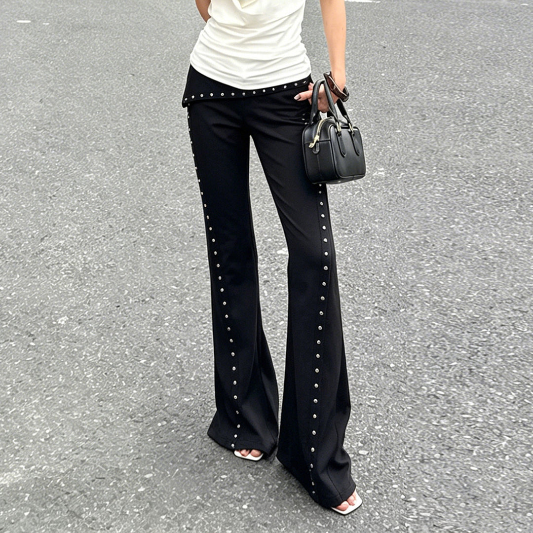 Women’s flared trousers with wrap waistband and decorative press stud placket Mune Fashion