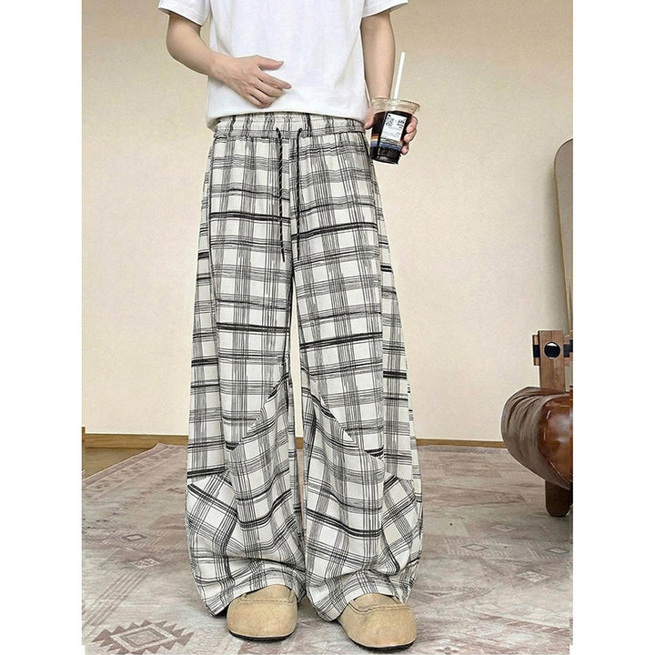 Men's wide checkered lounge pants with elastic waistband and drawstring