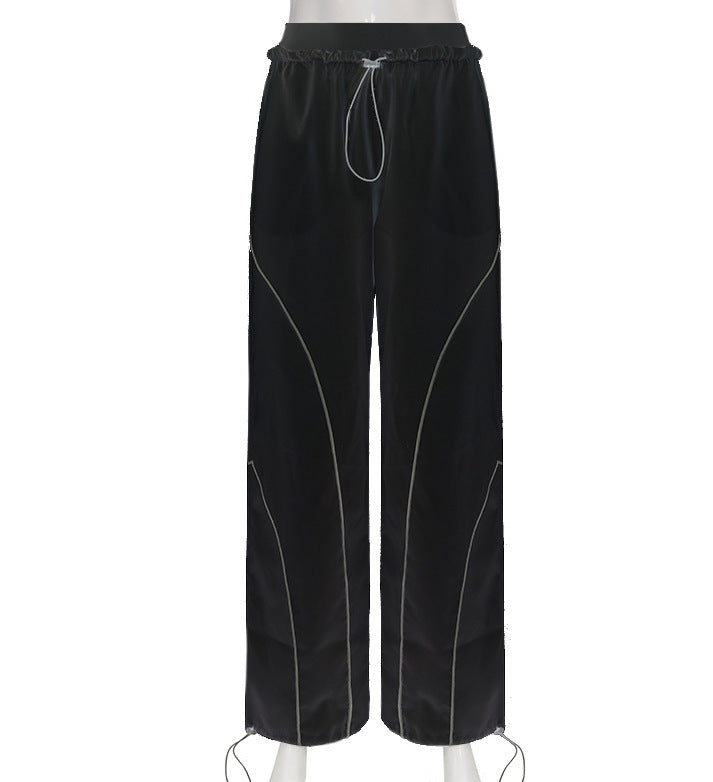 Women wide track pants with drawstring waistband, contrast seam design, and adjustable hem cords Mune Fashion