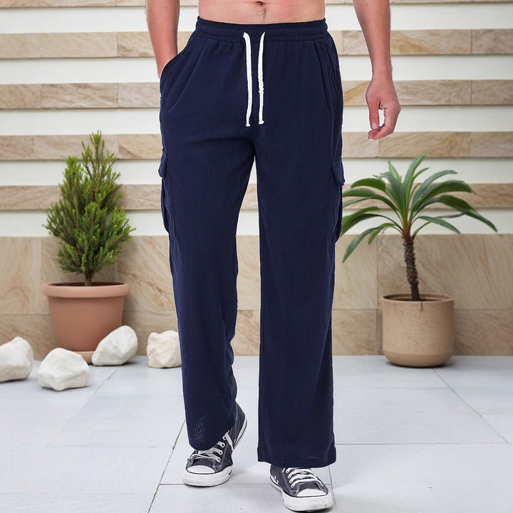 Men's corduroy-look cargo joggers with drawstring, elastic waistband, and patch flap pockets Mune Fashion
