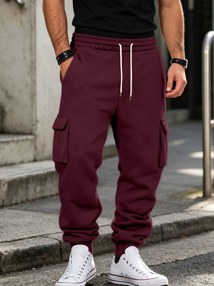 Men's cargo jogging pants made of cotton fleece with elastic waistband and leg cuffs Mune Fashion