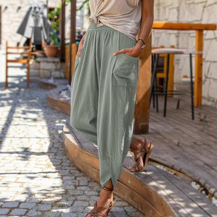 Women’s casual harem pants with elastic smock waistband, patch pockets, and gathered ankle cuffs Mune Fashion