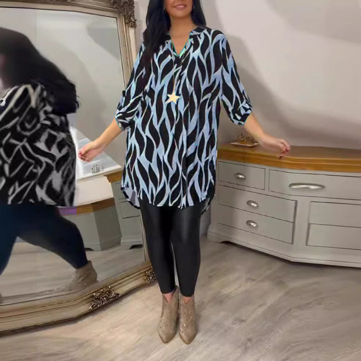 Women's oversized long tunic with abstract wave print, V-neckline and roll-up three-quarter sleeves Mune Fashion