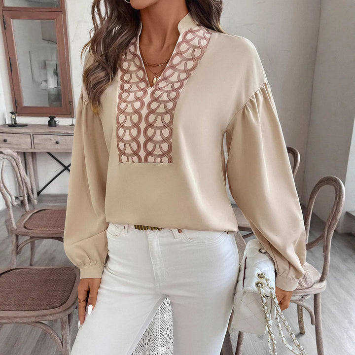 Ladies blouse with stand-up collar, embroidered V-patch and balloon sleeves Mune Fashion