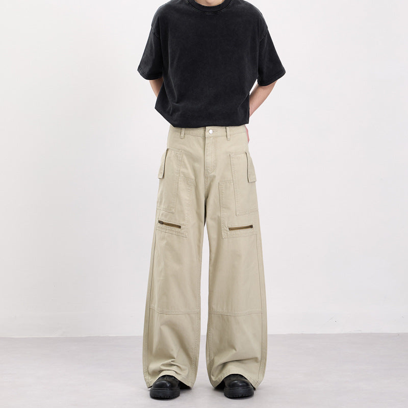 Men's baggy cargo pants in workwear style with large patch pockets and zipper details Mune Fashion