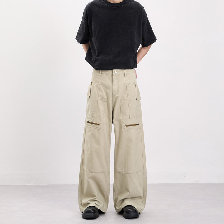 Men's baggy cargo pants in workwear style with large patch pockets and zipper details Mune Fashion