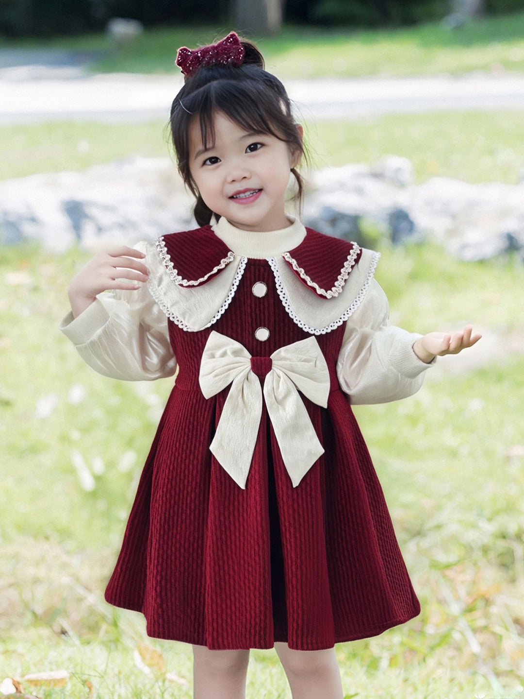 Girl's dress with festive collar and bow detail Mune Fashion