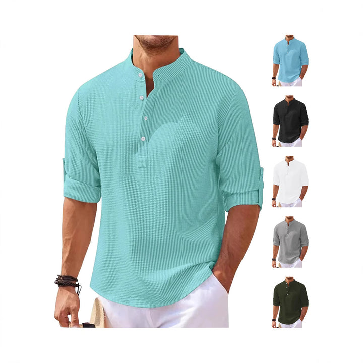 Women's oversized long sleeve Henley with stand-up collar waffle texture and sleeve fastening Mune Fashion