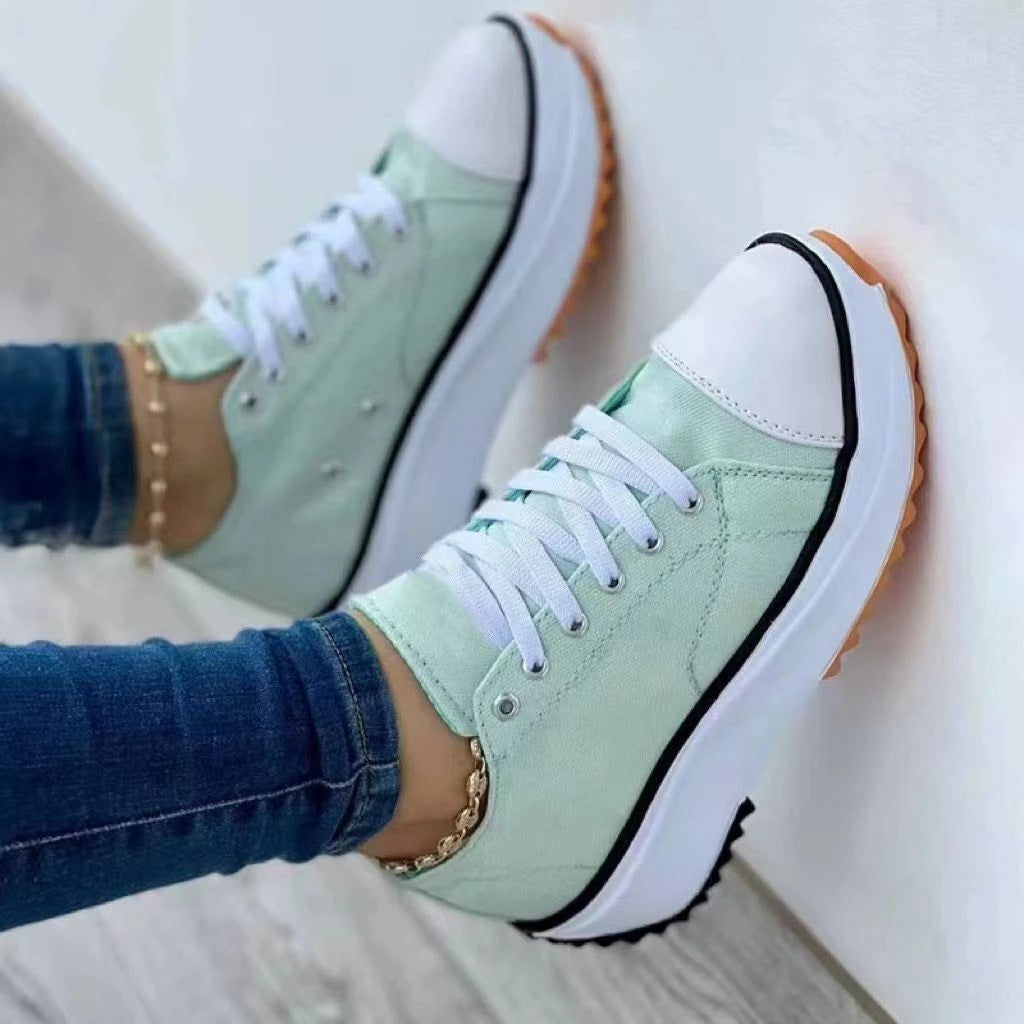 Women’s canvas platform sneaker with robust tread sole, toe cap, and lacing Mune Fashion