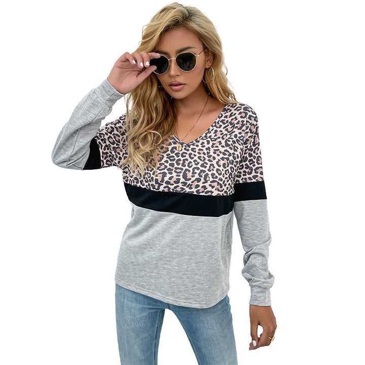 Women's long sleeve shirt with V-neck and leopard print in color block design Mune Fashion