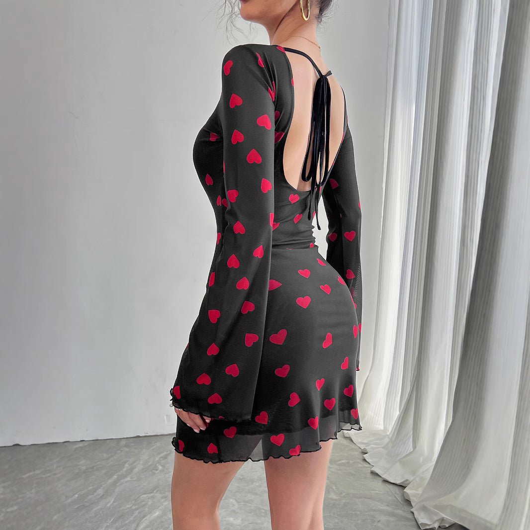 Women's figure-hugging mini dress made of fine mesh fabric with heart pattern and trumpet sleeves Mune Fashion