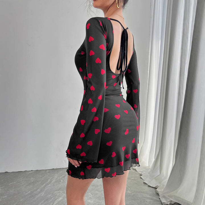 Women's figure-hugging mini dress made of fine mesh fabric with heart pattern and trumpet sleeves Mune Fashion