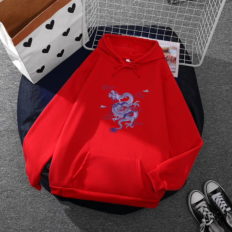 Unisex oversized hoodie with detailed dragon print, brushed fleece lining, and kangaroo pocket Mune Fashion