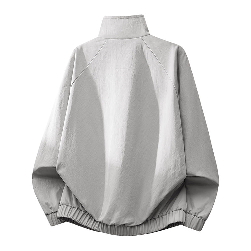 Men's ultra-lightweight windbreaker jacket with stand-up collar, elastic hem, and concealed snap button pockets Mune Fashion