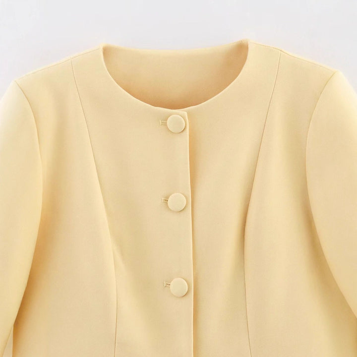 Women tailored round neck blazer jacket with concealed button placket, flap pockets and figure-enhancing seam lines Mune Fashion