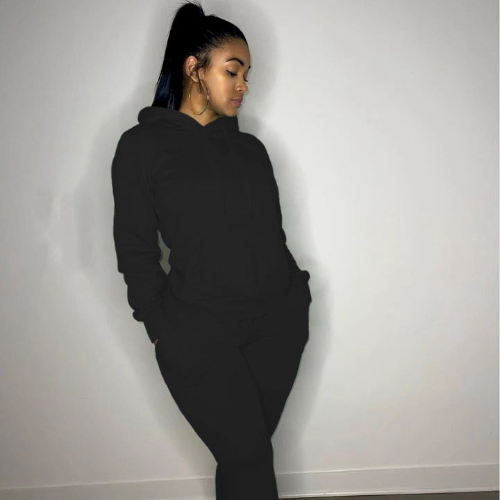 Women's tailored hoodie and jogger set with kangaroo pocket, high comfort waistband, and ribbed ankle cuffs Mune Fashion