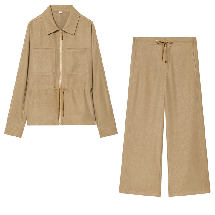 Women's loose high-waist pants with drawstring, decorative dividing seams, and flared leg Mune Fashion