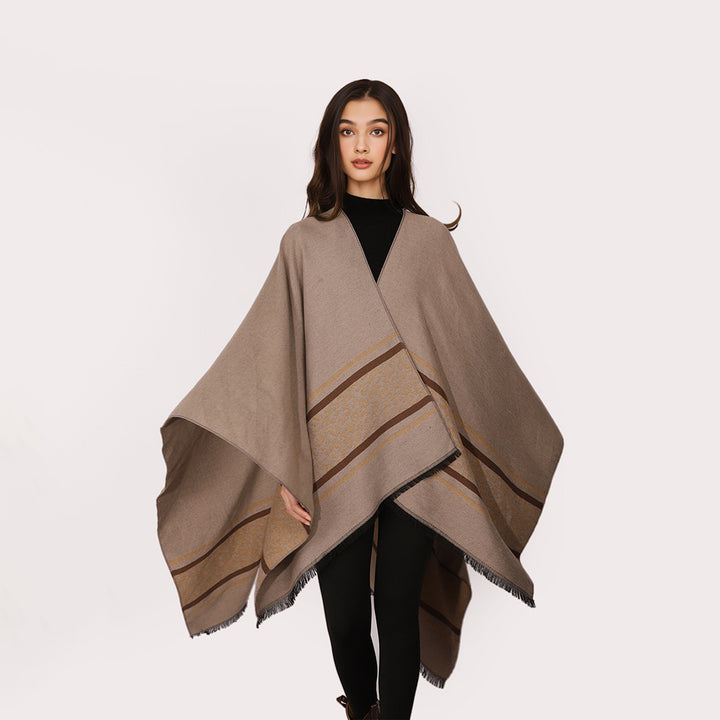 Women's cape poncho made of fine knit with leopard border and asymmetrical hem Mune Fashion