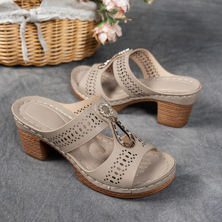 Ladies sandals with block heel, perforated upper material and decorative application Mune Fashion