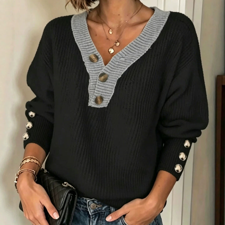 Women’s fine knit sweater with deep V-neck, contrasted button placket and decorative button sleeves Mune Fashion