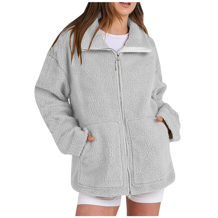 Women's oversized teddy fur jacket with stand-up collar, zipper, and patch pockets Mune Fashion
