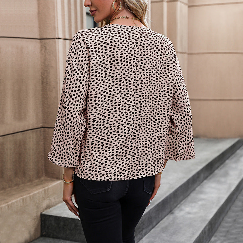 Ladies loosely falling viscose blouse with V-neck, dropped shoulder, and roll-up sleeves Mune Fashion