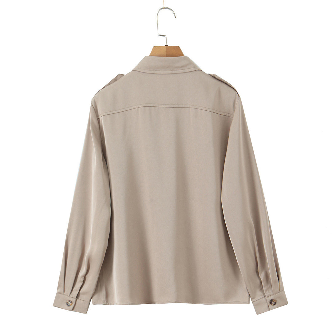 Women's oversized shirt blouse with applied breast pockets and shoulder epaulettes Mune Fashion