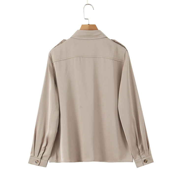 Women's oversized shirt blouse with applied breast pockets and shoulder epaulettes Mune Fashion