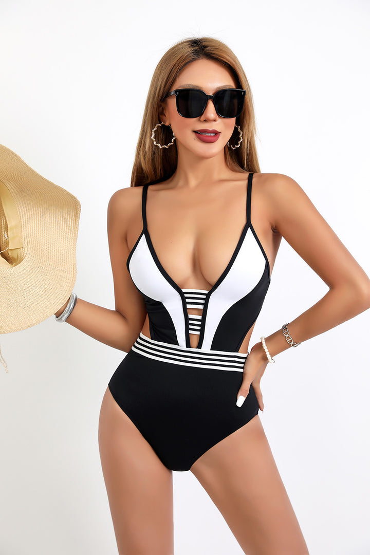 Women's Sporty One-Piece Swimsuit with Deep V-Neck and Side Cut-Outs Mune Fashion