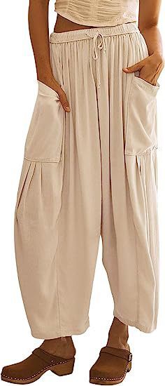 Women's wide palazzo pants made from a lightweight linen blend with drawstring and side pocket Mune Fashion
