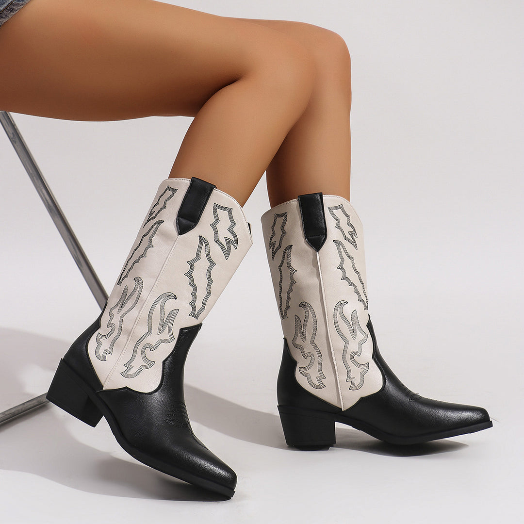 Women's cowgirl boots in western style with mid-high block heel, pointed toe cap, and decorative embroidery Mune Fashion