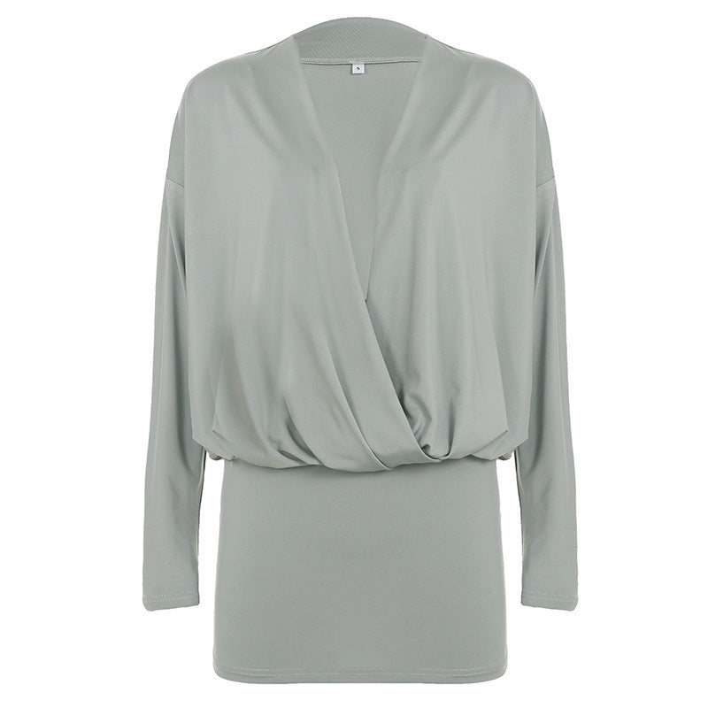 Women's draped wrap top with deep V-neckline, soft jersey drape, and fitted cuff Mune Fashion