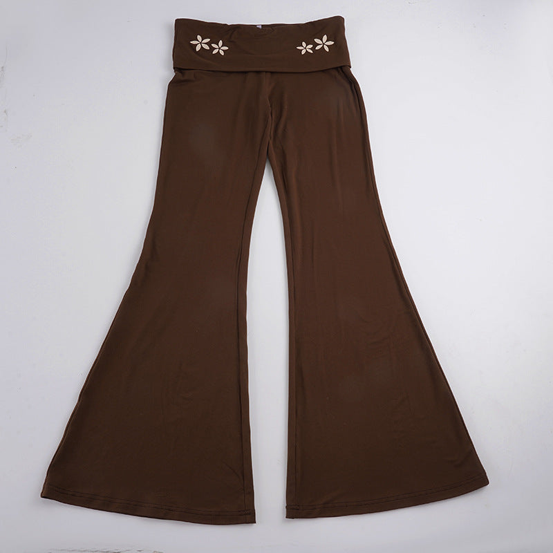 Women's Flared Yoga Pants with Folded Waistband, Comfortable Bootcut Fit and Laser-Cut Flower Detail Mune Fashion