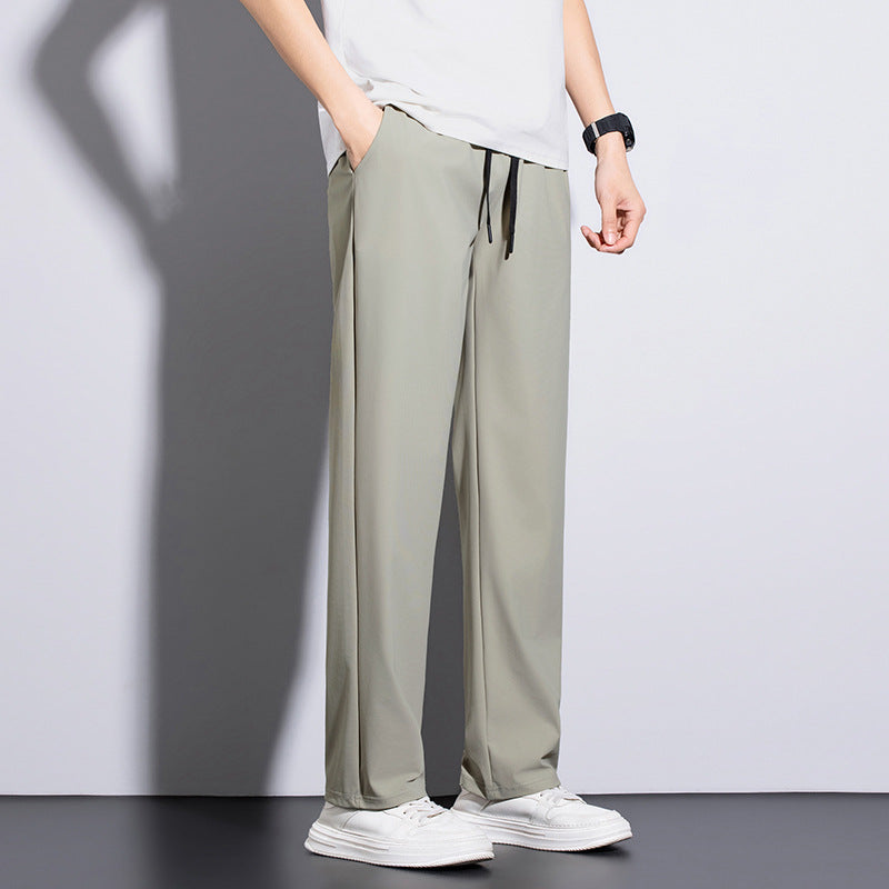 Men's sporty training pants with elastic waistband and practical pockets Mune Fashion