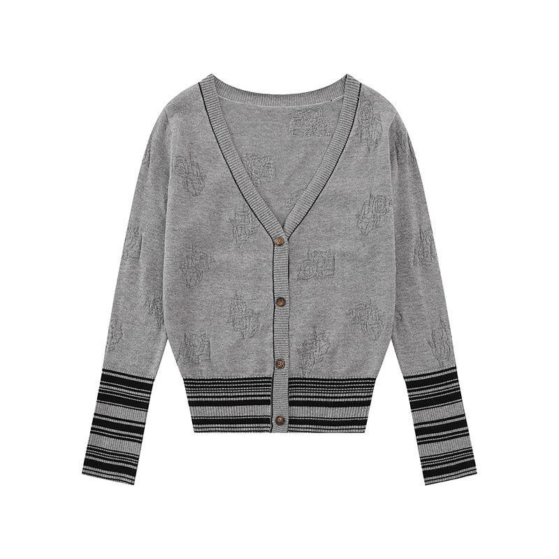Ladies cardigan with V-neck, fine jacquard pattern and contrasting cuffs Mune Fashion